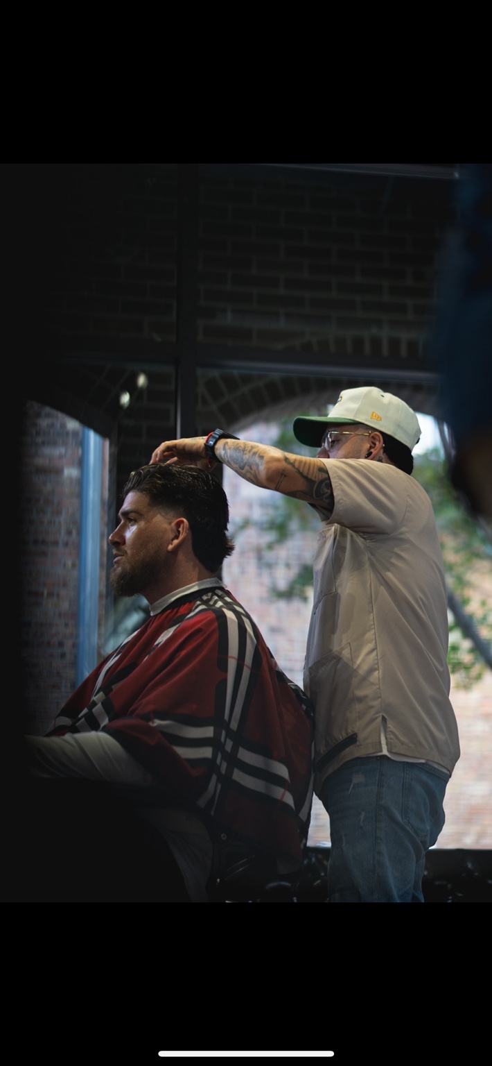 Boy's textured crop with a clean mid fade at Lux Cuts